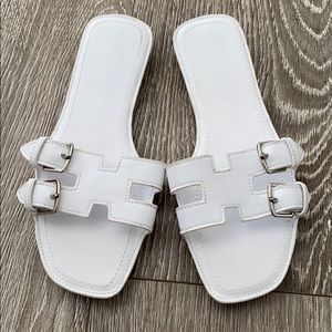 White slip on sandals